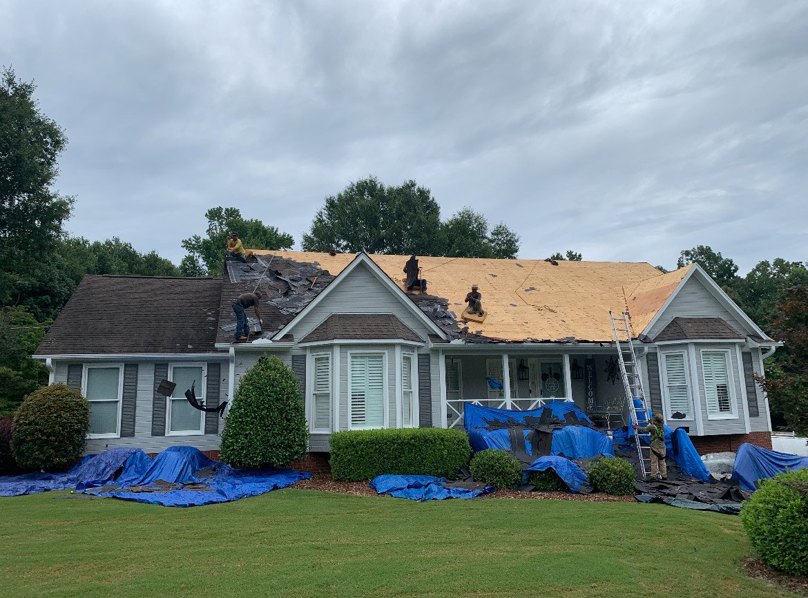 Residential roof replacement in progress