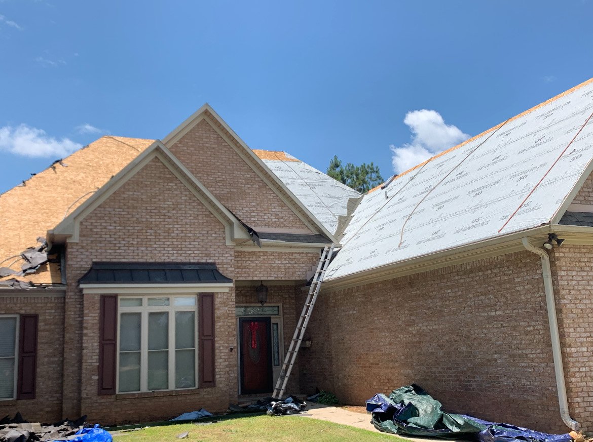 Residential roof with underlayment and exposed roof decking